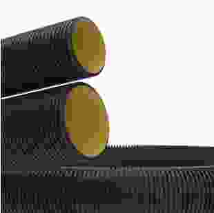 Купити Труба гнучка двошарова електротехнічна з поліетилену, зі сталевою затяжкою для зонду та муфтою, Ø зов./вн., мм 110/94; стійкість до стискання не менше 450Н, колір чорний. Бухта 50м.